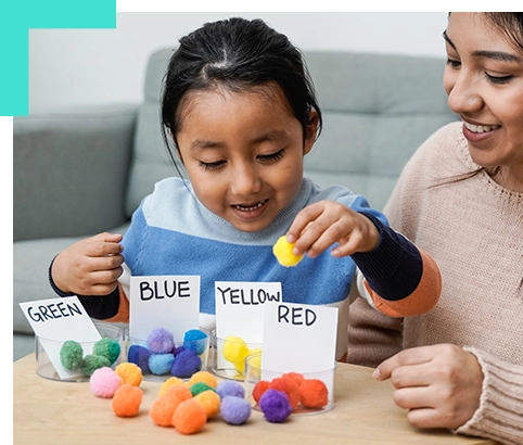 About Approach Therapist with a child performing AIM therapy